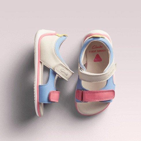 Babies sandals with pink and blue straps, perfect for summer adventures.